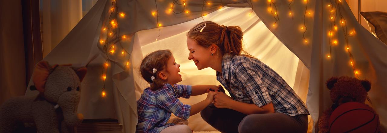 Green Homes Illinois, Child and mom in play tent, IL